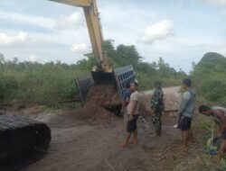 Satgas TMMD Reg ke-123 Kerahkan Alat Berat Untuk Penimbunan Badan Jalan