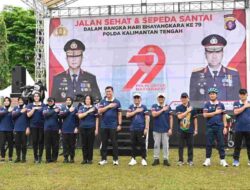 Gubernur Agustiar Semangati Peserta Jalan Santai Bhayangkara sebelum Kunker ke Gunung Mas